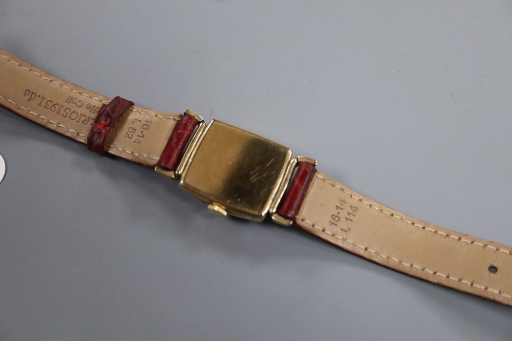 A ladys 1950s? 10k gold filled Longines manual wind wrist watch, on later associated strap.